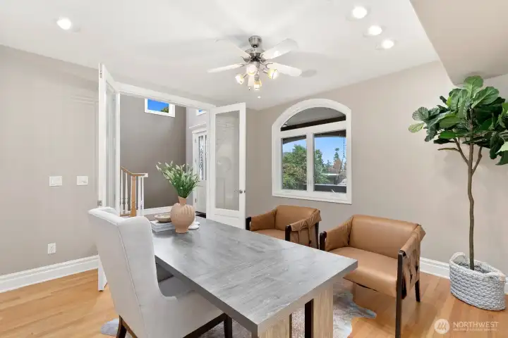 Heading down to the entry/main level, you'll find this dedicated office with french doors.