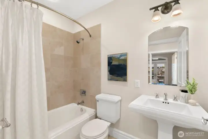 Shared bath for the first bedroom.