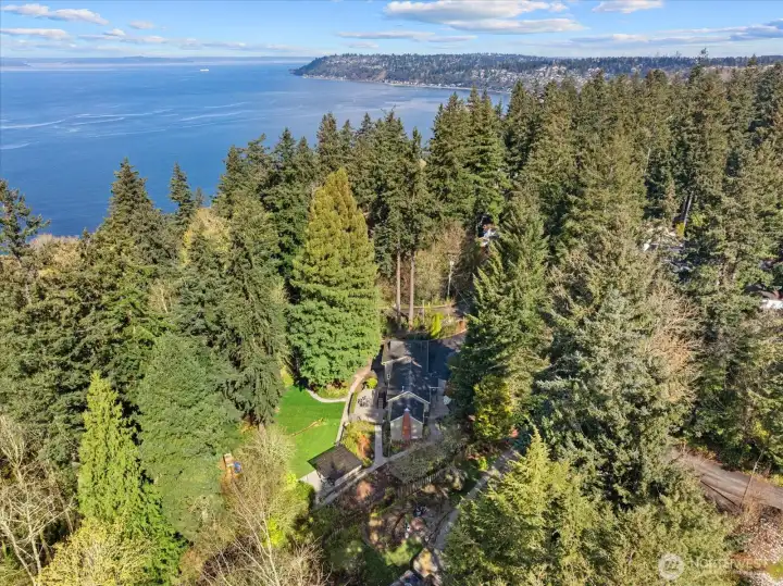 Bordering Eagle Landing Park, this private sanctuary offers an exceptional connection to nature and effortless indoor-outdoor living.