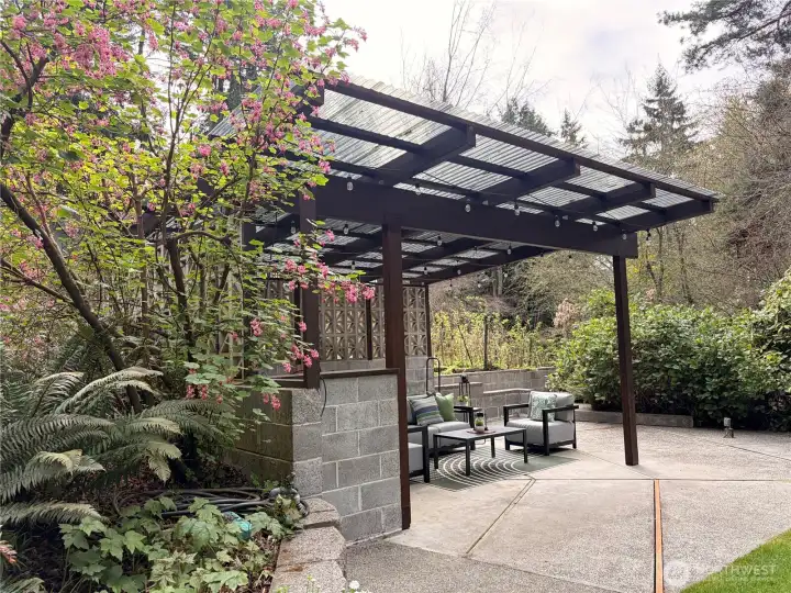 The lanai has a new roof, and is ready to dazzle your guests with seating area and built in firepit!
