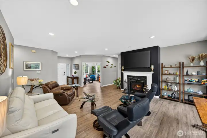 This living room is a versatile space that allows for furniture to be arranged in several ways.  Those huge Picture Windows are on the right side.