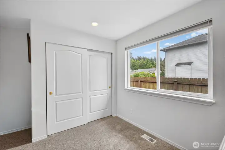 This is the second Guest Room with closet.  You can see the fully fenced side yard.