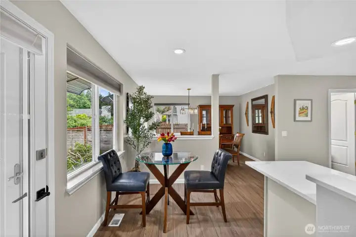 This photo is taken from the passageway to the Livingroom. That door on the   left leads out to the Entertainment Patio and Private Backyard,