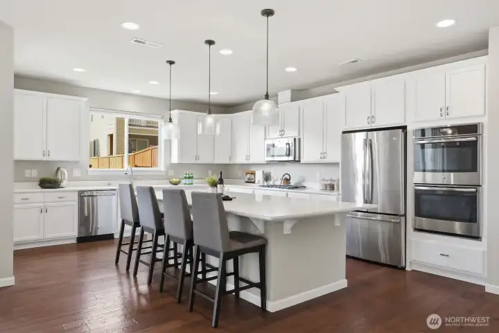 Gourmet kitchen with double ovens and tons of storage