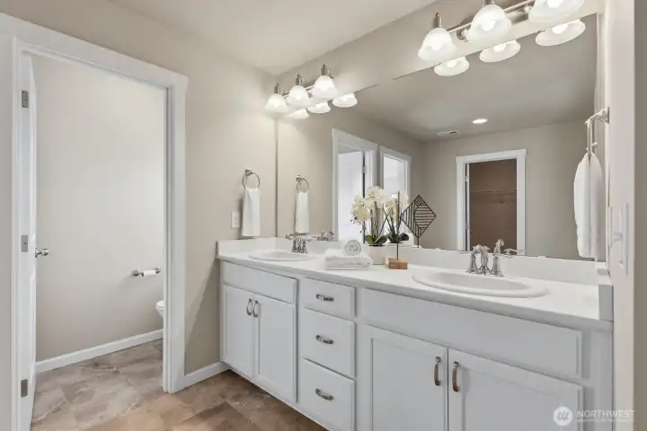 Dual vanity and private toilet