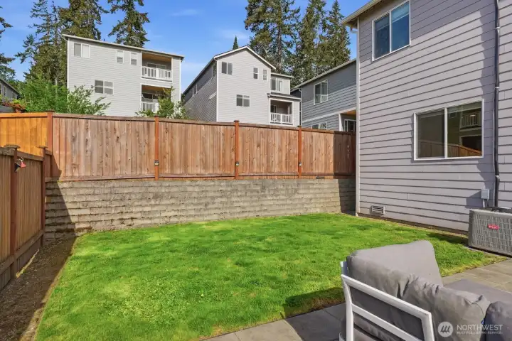 Flat, sunny, low maintenance, fenced yard.