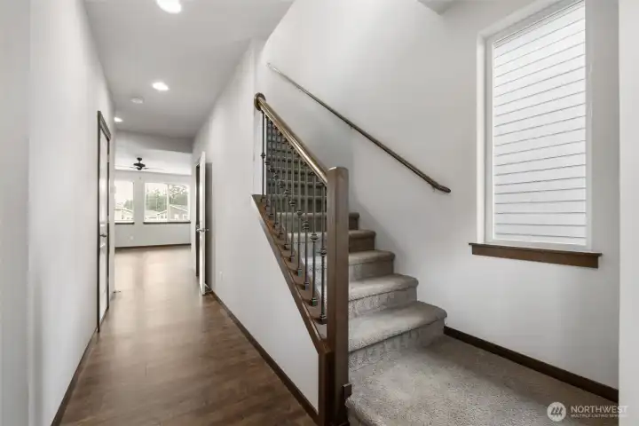 From the first step inside, the home starts to tell the right story: light, openness, and a floorplan that draws you naturally toward the main living space.