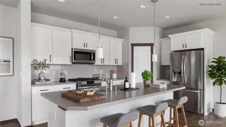 Furnished or not, the story is clear: this kitchen is built to be used, with the island becoming the natural landing place for coffee, meals, conversation, and the everyday routines that keep life moving. Virtual staging used.