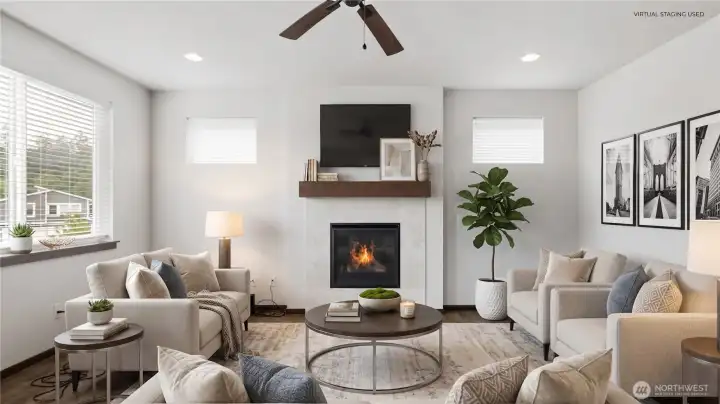 This space shows how easily the room can come to life, with places to gather, stretch out, talk, watch, read, and let the day settle in comfortably. Virtual staging used.