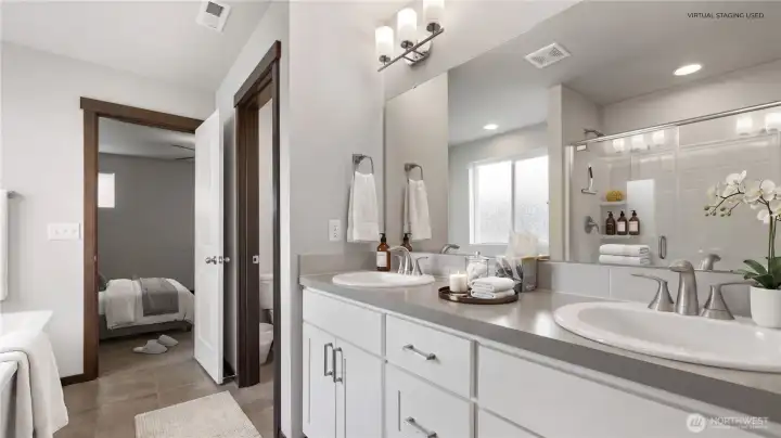 A few thoughtful touches show how this bath can feel polished, organized, and easy to use, with space to get ready without feeling crowded. Virtual staging used.