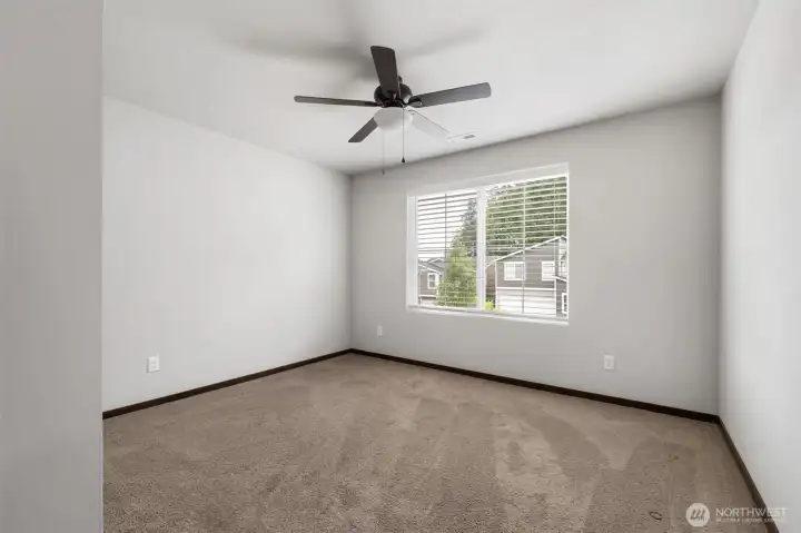 A blank room is not a drawback here. It is an invitation to imagine exactly what you need next: bedroom, guest space, hobby room, playroom, or a place to finally get the treadmill out of the garage.