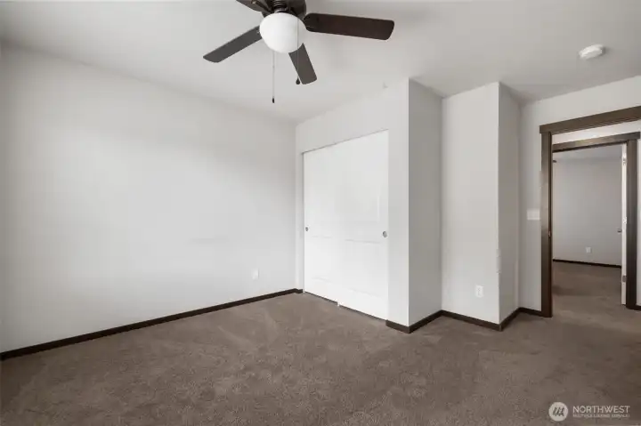 The closet gives this room its anchor, turning an open blank space into something easier to picture as a bedroom, guest room, creative space, or whatever life needs next.