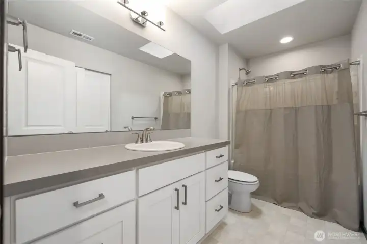 Clean, simple, and right where you need it, this upstairs bath does its job without drama, which is exactly what you want from a bathroom.