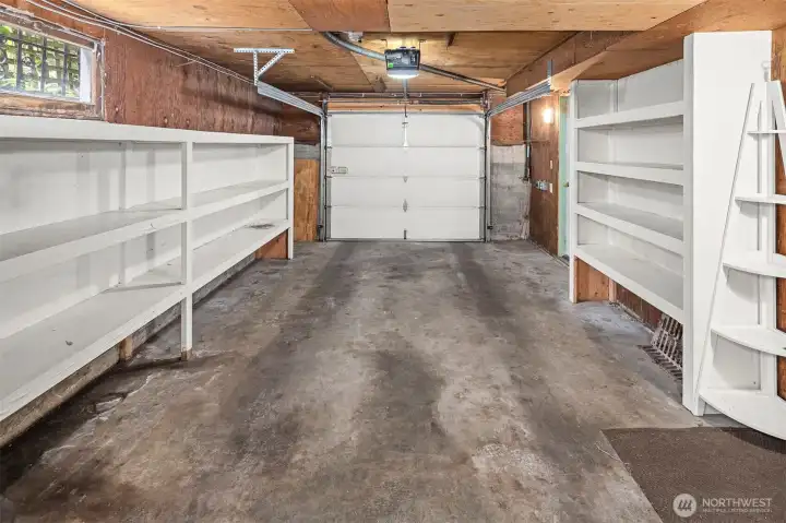 Extra deep garage for parking and storage.  Electric car charging