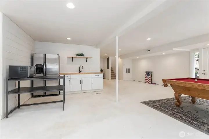Has exterior door to the right and one into the garage and one to the front yard. Has exterior door to the right and one into the garage and one to the front yard.