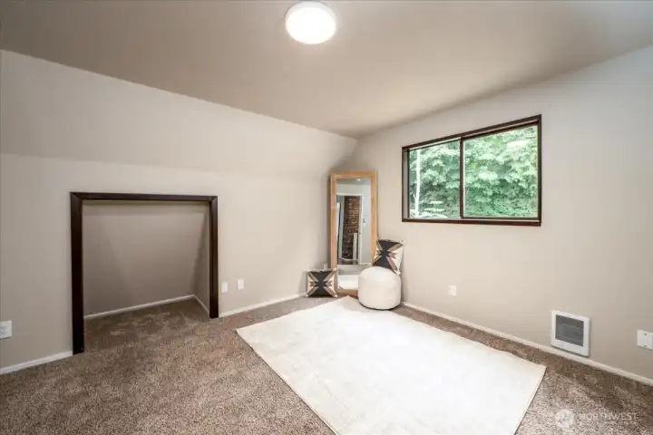 Perfect office, guest room or exercise space.  You could make the entire upper floor a primary suite.