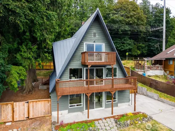 Metal roof for years or peace of mind. All new windows and sliders on the west side of the home.
