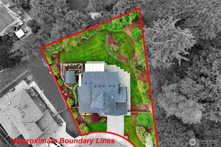 Approx. lot lines shows this home surrounded by trees Approx. lot lines shows this home surrounded by trees