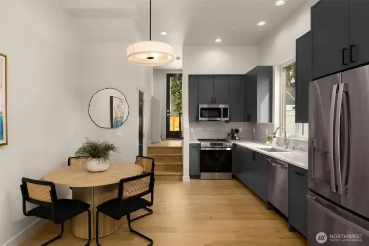Resting nearby, a dining space designed for four Resting nearby, a dining space designed for four