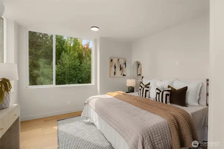 Secondary bedrooms live large, with space for a king-sized bed (photo of different home in the community, like finishes) Secondary bedrooms live large, with space for a king-sized bed (photo of different home in the community, like finishes)