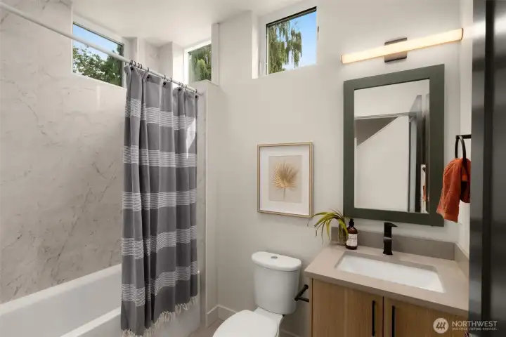 Nearby, the secondary bathroom with shower & tub (photo of different home in the community, like finishes) Nearby, the secondary bathroom with shower & tub (photo of different home in the community, like finishes)