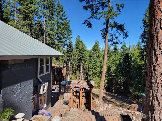 The terraced decks offer beautiful views from every angle and allow for enjoying the sun or shade all day long.  *NEW ROOF *NEW PAINT * FIREWISED AND WIDENING OF THE DRIVEWAY* WEATHERPROOF PLUMBING*