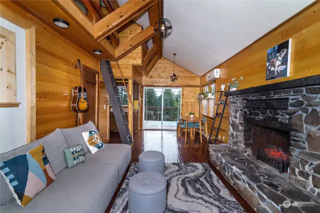 The Charm and character of this cabin can be seen top to bottom, with the knotty pine interior, laminate hardwood floors and trim and an architectural design that accentuates the warm and cozy mountain feeling.