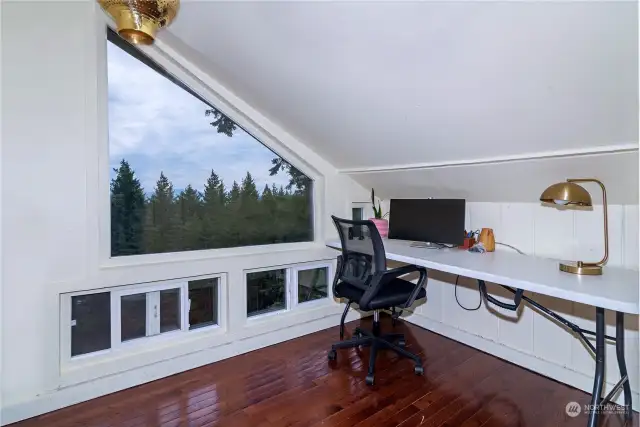 This room has been used as a home office and has the best views in the cabin.