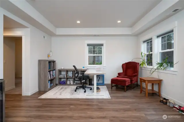 Other half of the Rec room showing the door to the bedroom to the left of the photo.