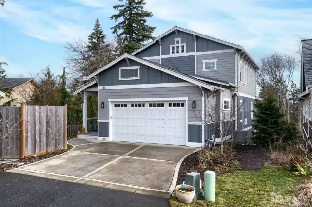 Home features a 2 car garage and nice covered front porch.