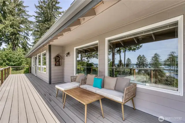 Further down the deck is access from the primary suite. So convenient for morning or evening relaxing...