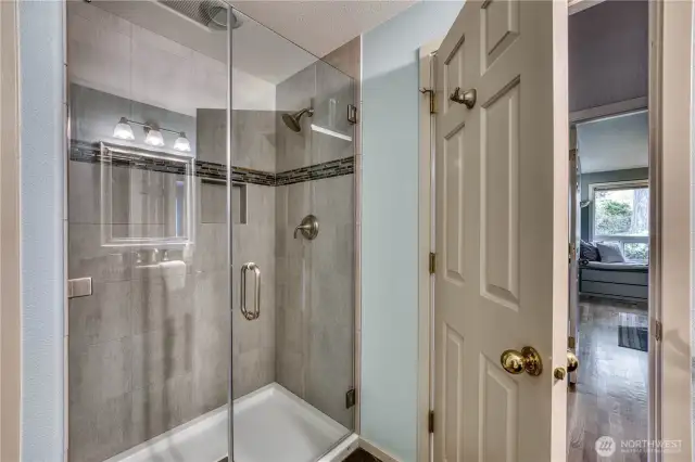 The shower in the hall bath is a walk-in for your or your guests' convenience.