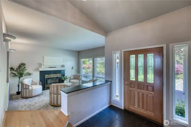 The lovely tiled entry leads to main living area on one side and this cozy, more formal area on the other.