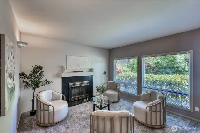 Complete with gas fireplace and new carpet, this space is perfect for more intimate conversations.