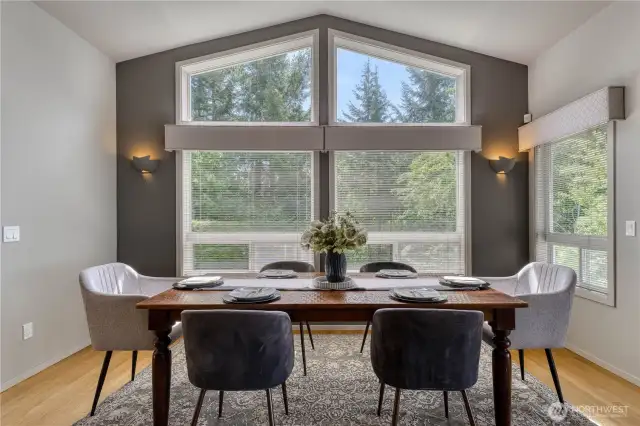 More large windows overlooking the side yard make this space even more inviting.