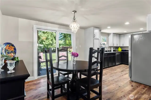 Dining Area, Patio to rear yard, Kitchen on right