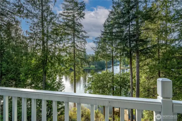 Water view deck with room for dining and entertainment.