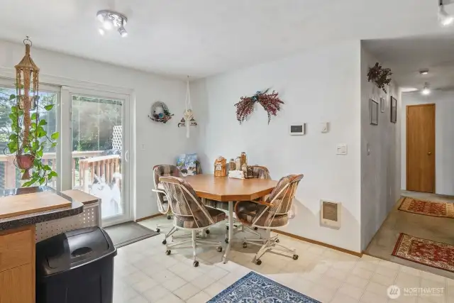 Kitchen w/Eating Space and Slider Leading to Back Deck