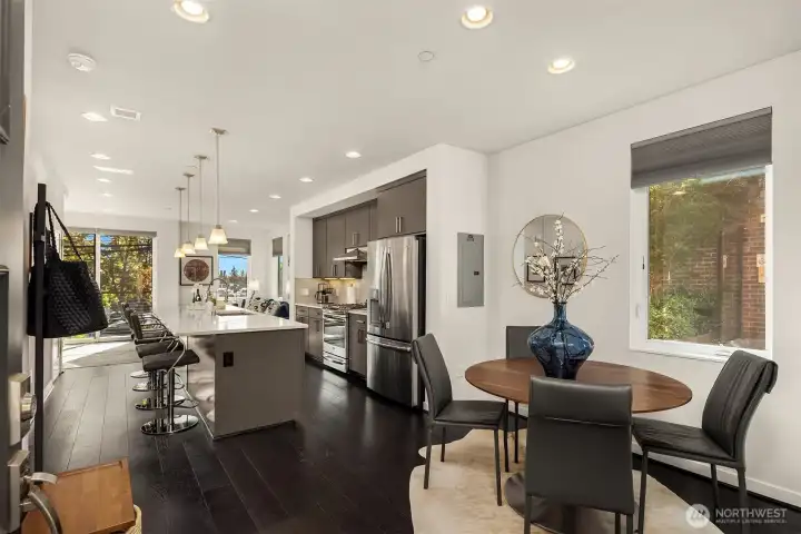 Dining room and views of the kitchen and great room