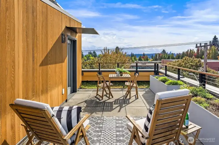 Corner unit, private rooftop deck. Extra privacy and light!