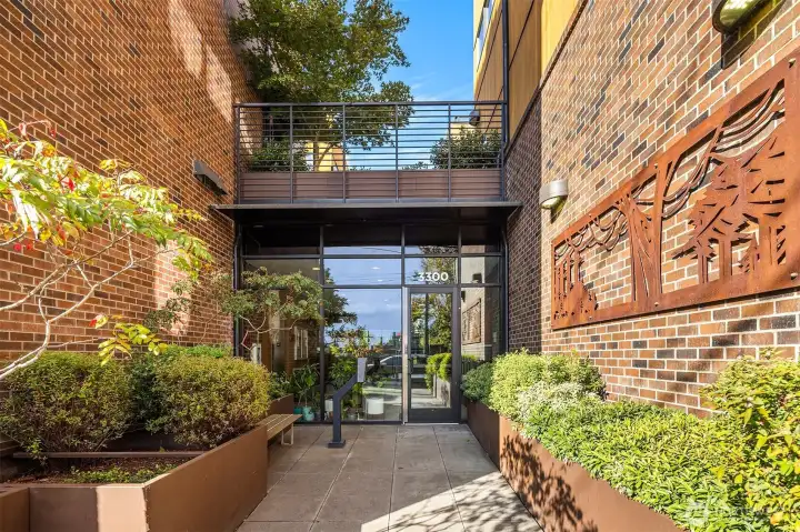 Entrance to the building.  This is secure and keeps your packages safe and allows you or your guests to also be safe.  you will probably enteer via the secure garage but this is how your friends and family will come. You can meet them in the lobby or buzz them in.