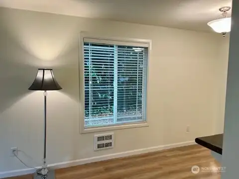 Living room area.  New light fixture over dining area.