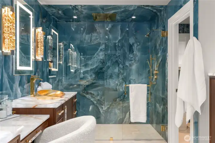 Recently updated primary bathroom with blue marble.