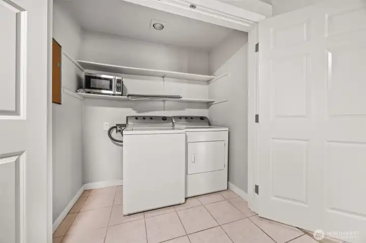 Laundry is tucked just off the kitchen—super convenient