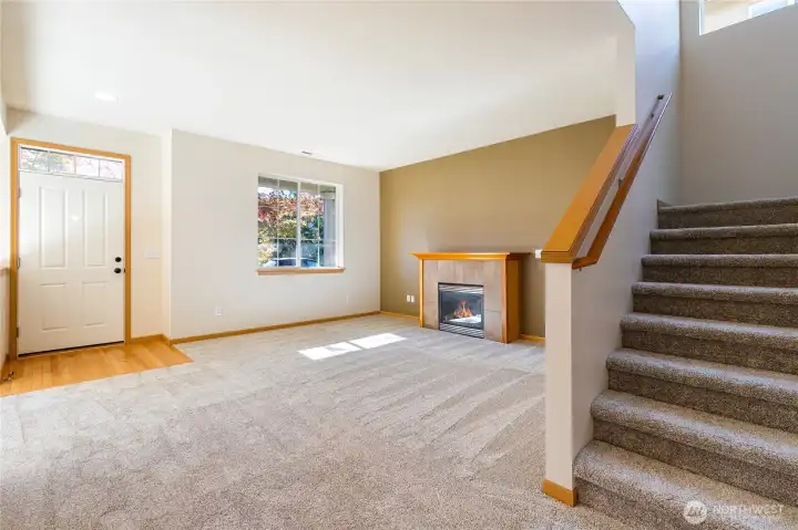 Stairs lead to upstairs bedrooms + bonus/flex room