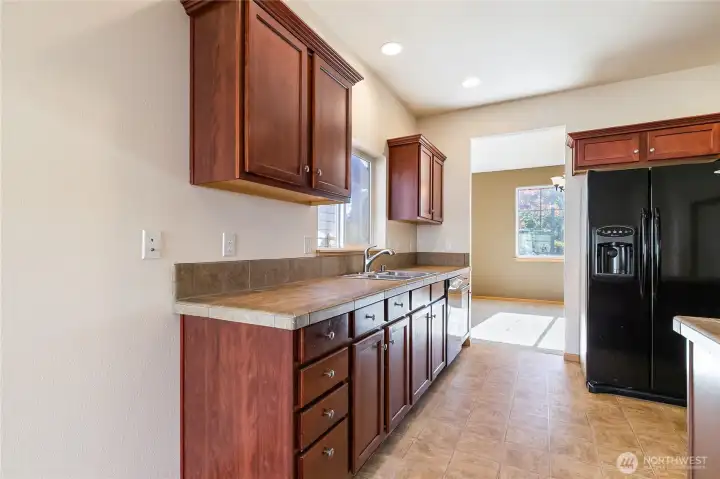 Kitchen looking back to formal dining area