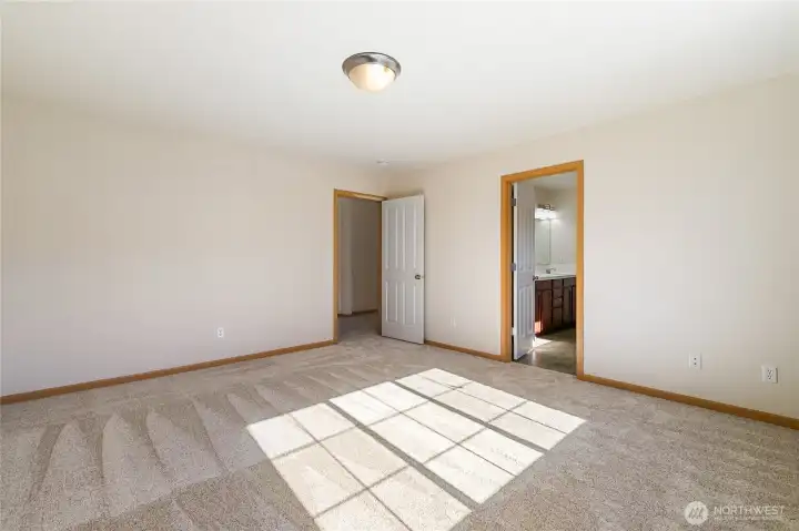 Primary with door to right leading to ensuite