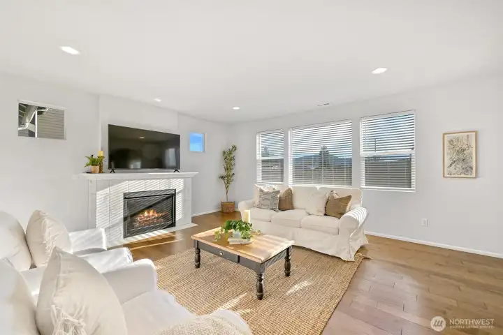 Gas fireplace and large bright living space