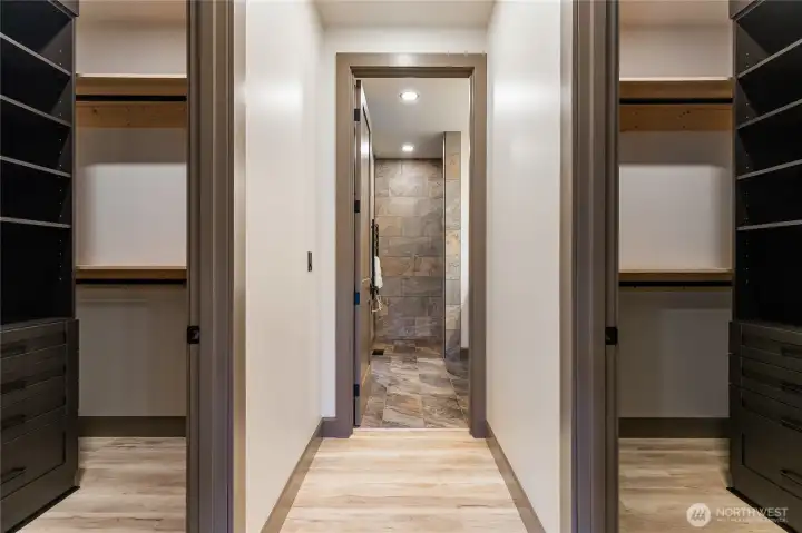 His/Her closets leading to primary bathroom
