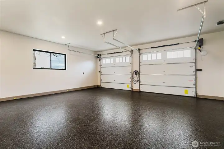 Oversized double car, epoxy coated, EV charging garage
